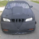 Illustration for article titled This 'Custom' Mazda 626 Is Proof That Energy Drinks Are Bad For You